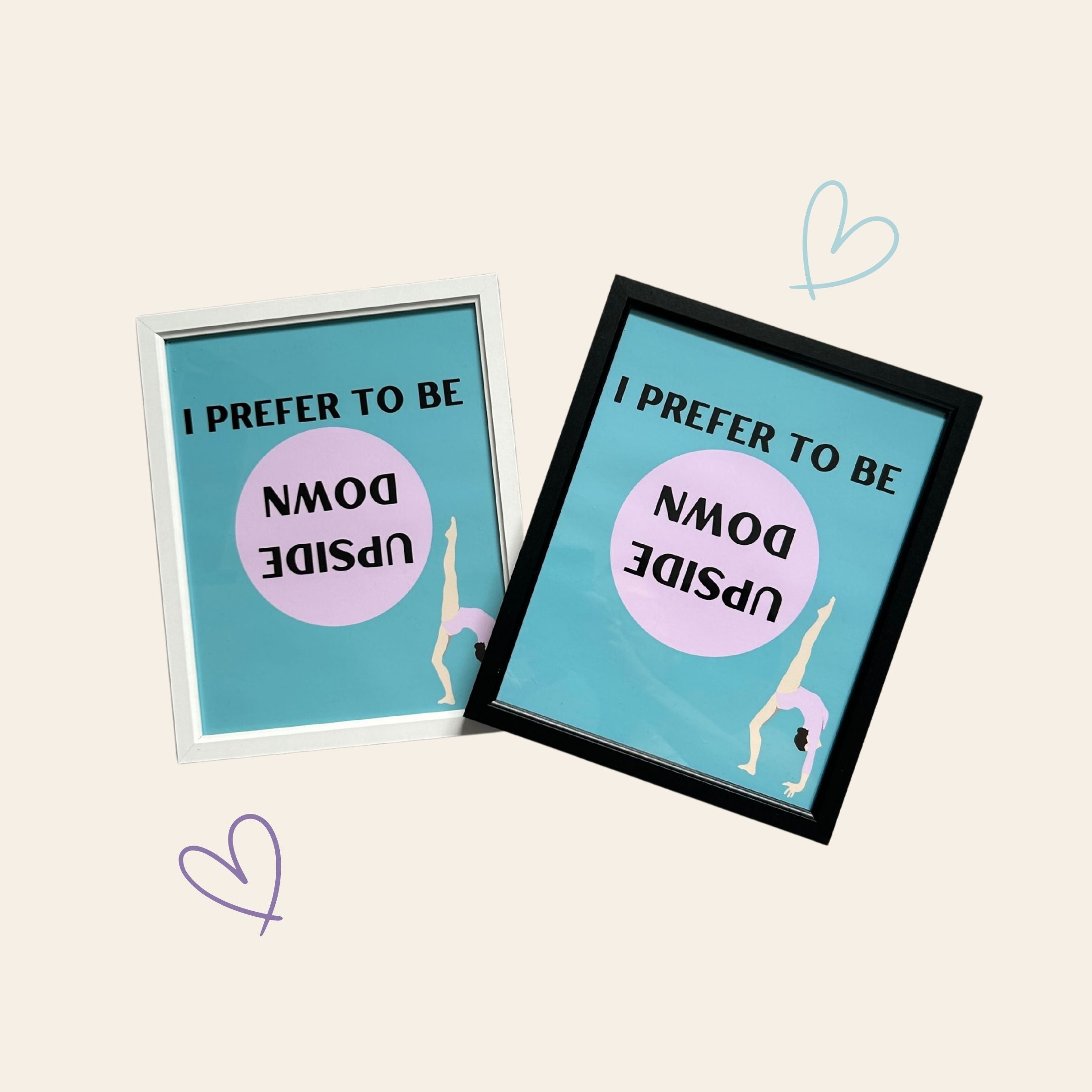 Two framed gymnastics prints with text and a graphic of a person upside down on a light beige background.