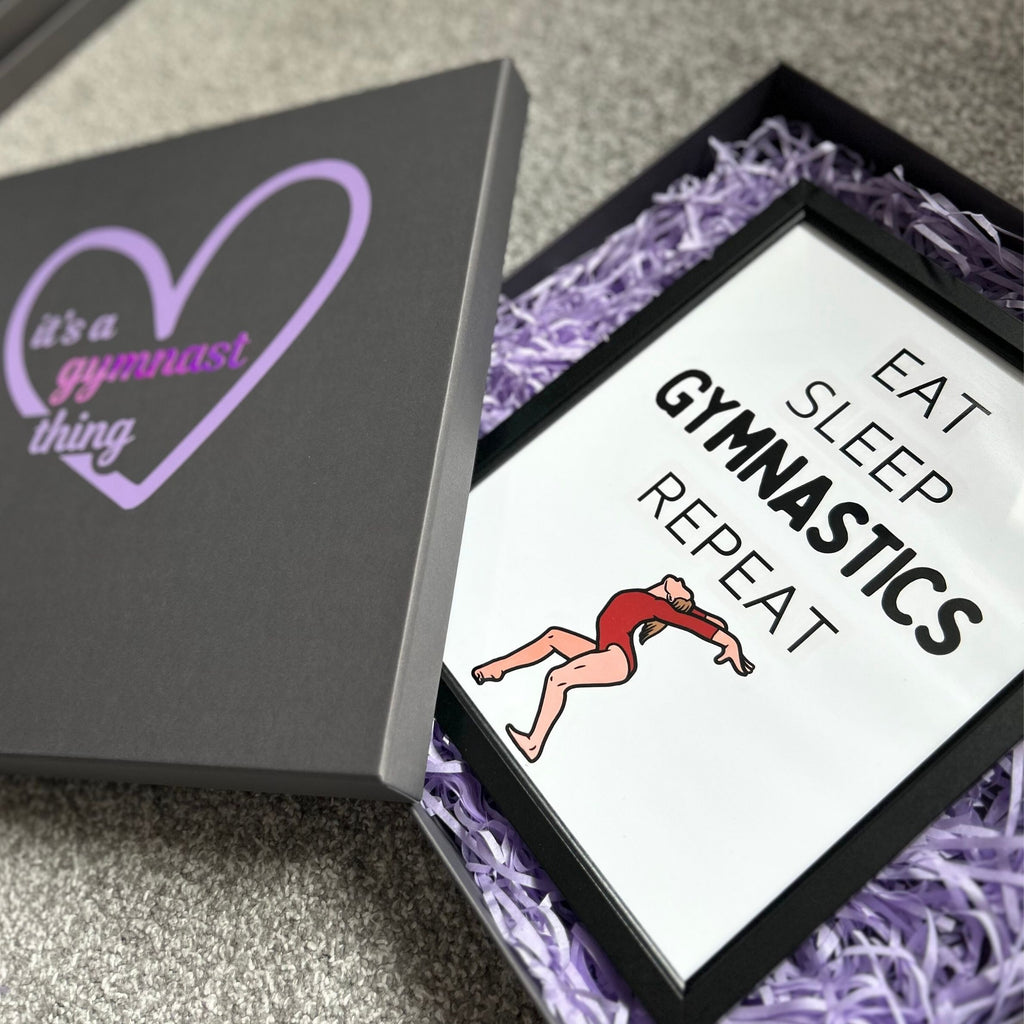 Gymnastics gift box with 'it's a gymnast thing' text and 'Eat Sleep Gymnastics Repeat' print.